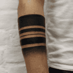 Black Line Tattoo Meaning & Symbolism (Mourning)