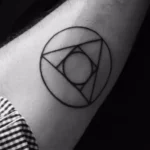 Circle with Triangle Inside Tattoo Meaning & Symbolism (Recovery)