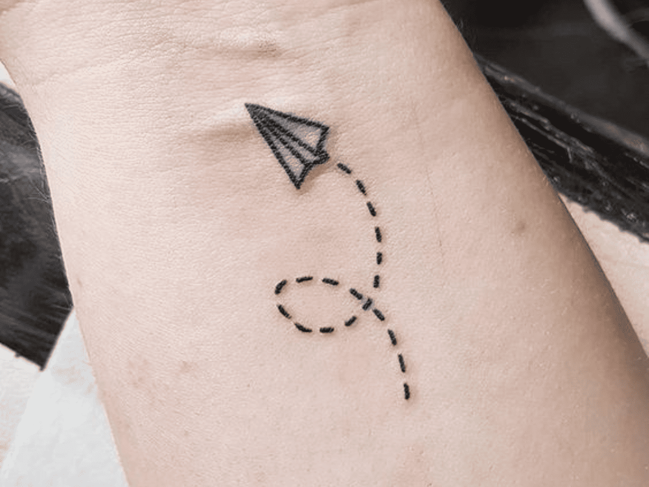 paper-plane-tattoo-meaning-symbolism-motivation