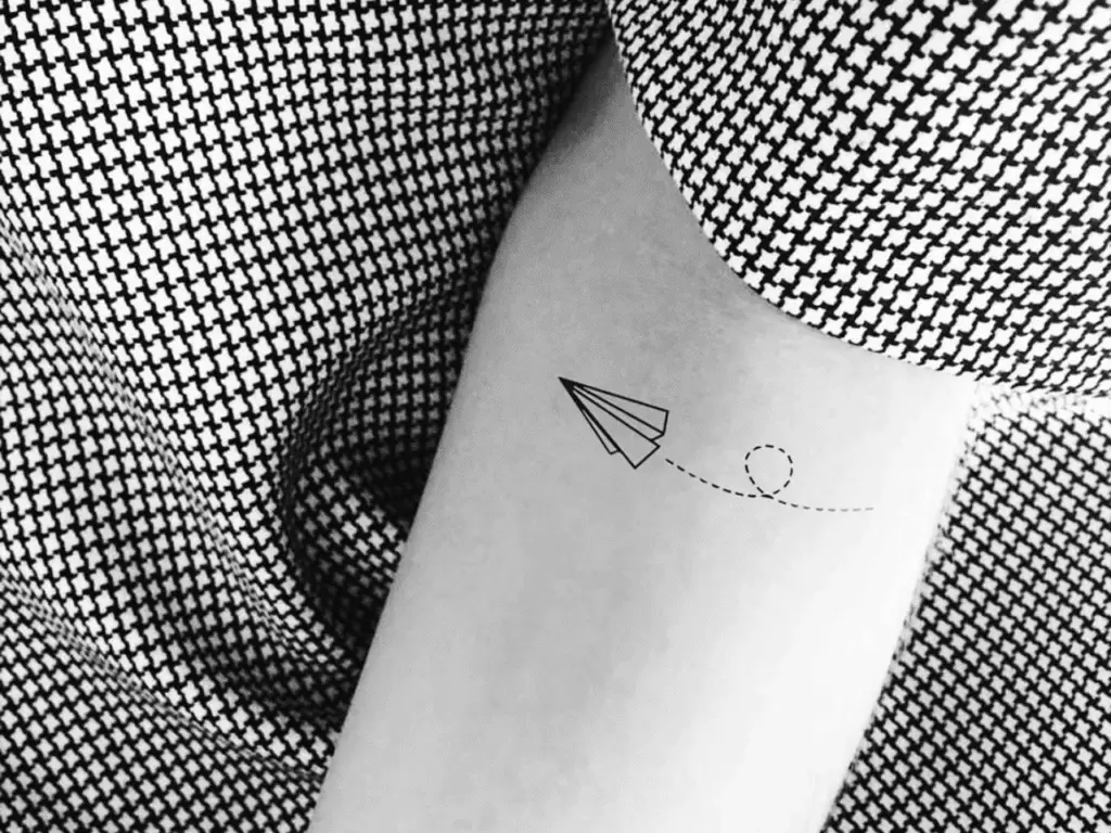 Finally got my first tattoo Paper plane done by sourgrapes at 1322 tattoo  studio London  rtattoos