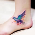 Soothing Wings: Dove Tattoos on Ankle Ideas and Designs