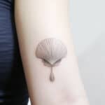 The Clam Shell Tattoo: Unveiling the Secrets Beneath the Surface