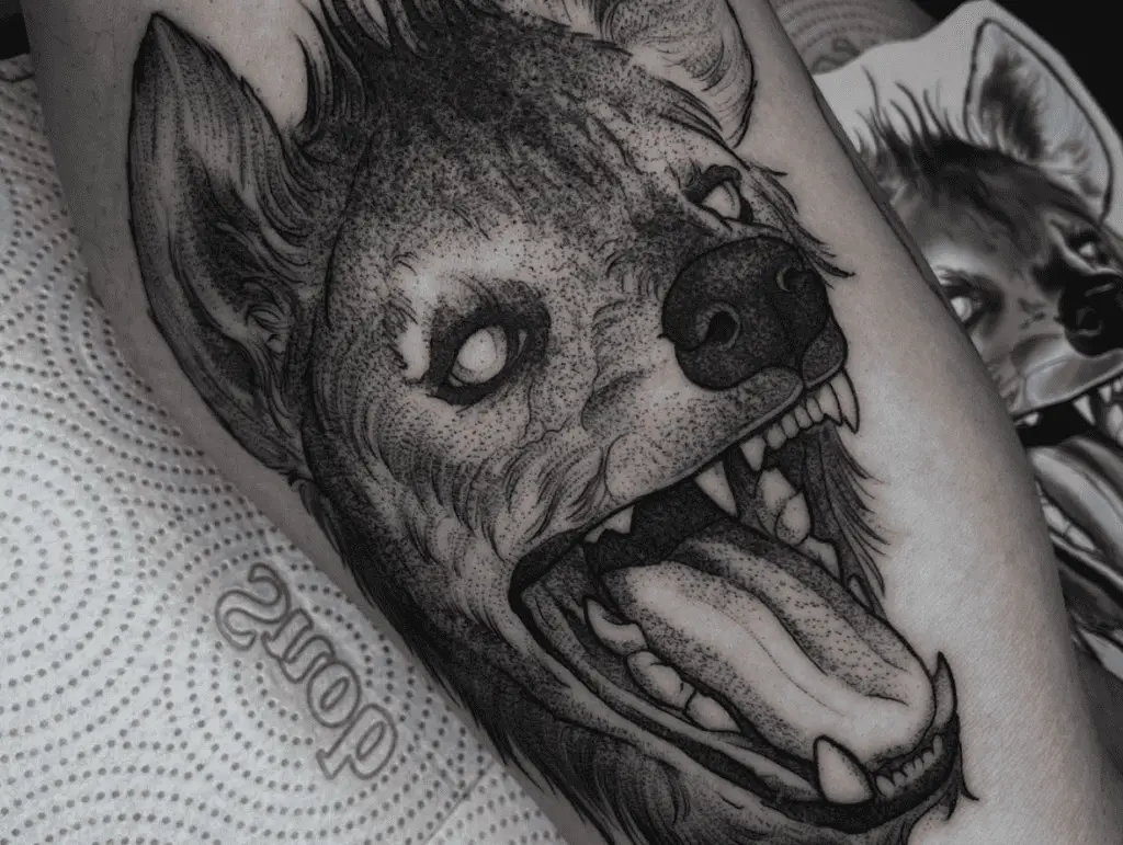 Hyena Tattoo Meaning Unraveling the Enigmatic Symbolism + Designs