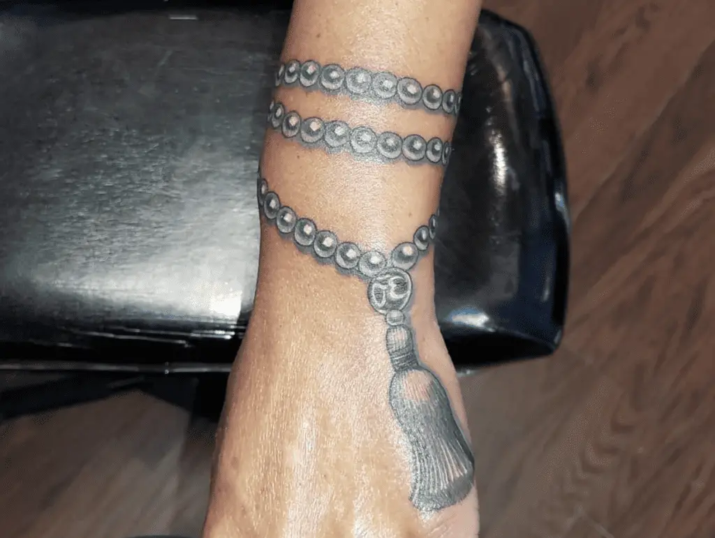 mala bead tattoo