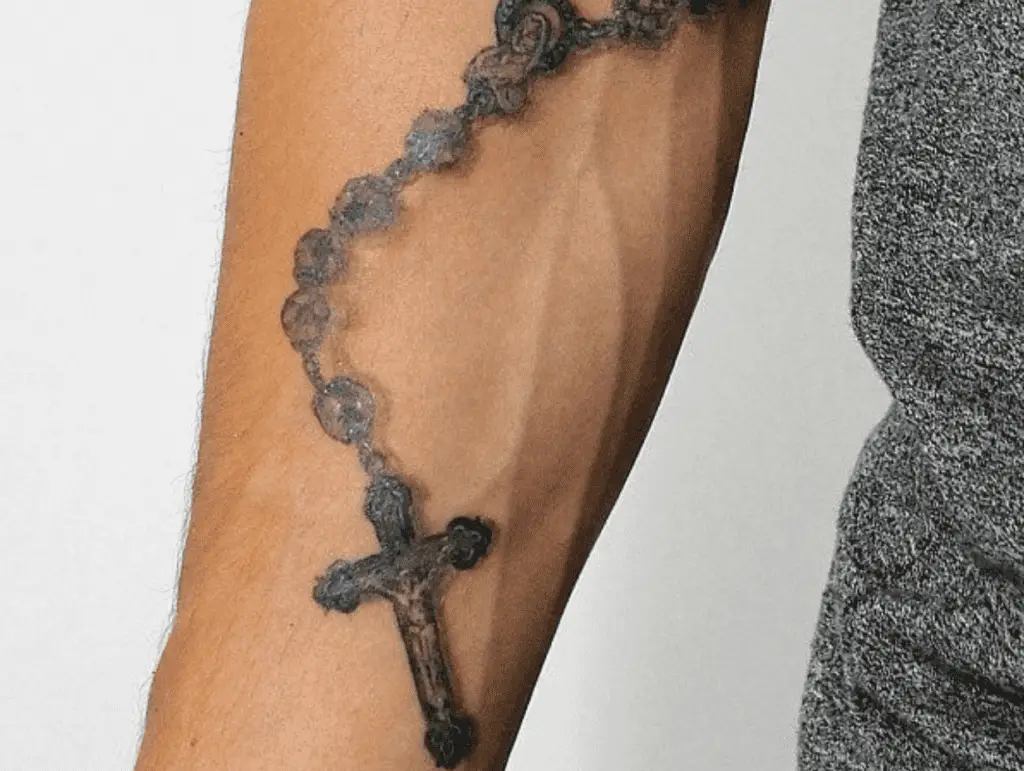 mala bead tattoo arm