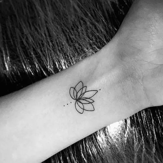 Minimalist lotus flower Tattoo