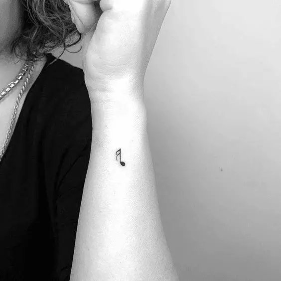 Minimalist Music Note Tattoo