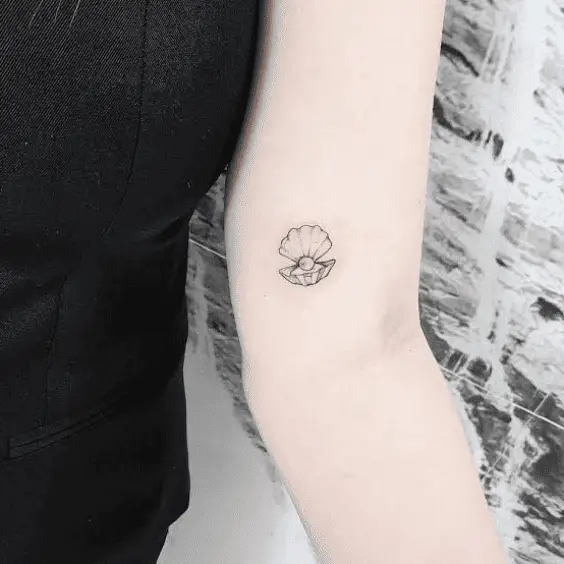 Minimalist Pearl Tattoo