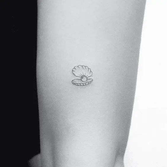 Minimalist Pearl Tattoo