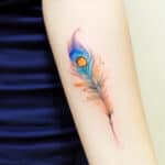 Peacock Feather Tattoo Meaning: Unveiling the Symbolic Splendor