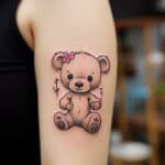 Bear Hugs Forever: Enduring Love Behind Teddy Bear Tattoo Meaning + Designs